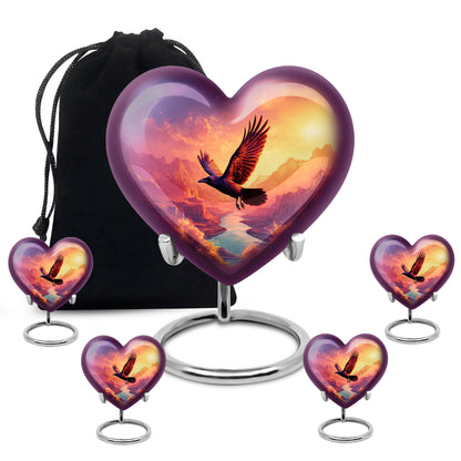 Deep Purple Crow Cremation Urn close-up of engraving and surface detail - heart-shaped crow design symbolizing eternal love - memorial set with one large and four small urns