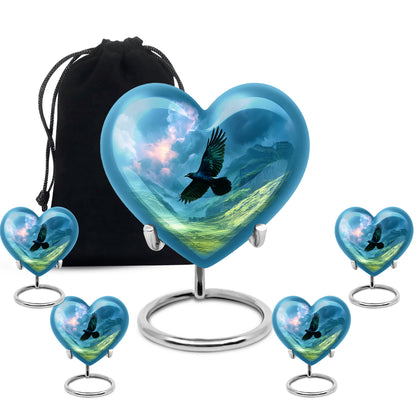 Sapphire Blue Crow Cremation Urn close-up of engraving and surface detail - romantic heart urn with crow motif on aluminum - memorial set with one large and four small urns