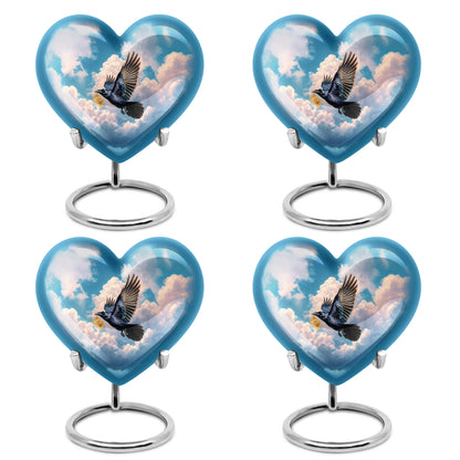 Indigo Crow Cremation Urn angled view of lid and engraved motif - loving heart memorial featuring crow pattern - 10 inch aluminum urn for cremated remains