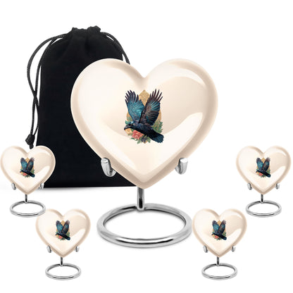 Sunrise Gold Crow Cremation Urn close-up of engraving and surface detail - heart-shaped crow design symbolizing eternal love - memorial set with one large and four small urns