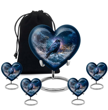 Celestial Blue Crow Cremation Urn close-up of engraving and surface detail - heart-shaped crow design symbolizing eternal love - memorial set with one large and four small urns