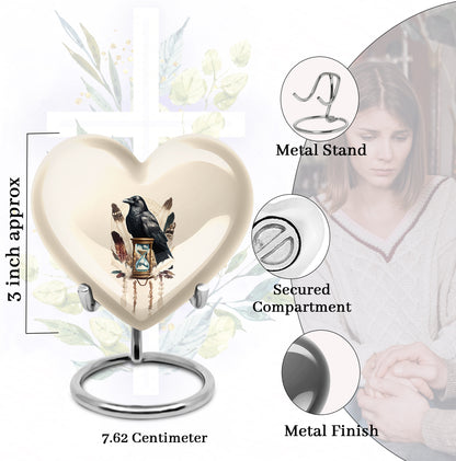 Ivory White Crow Cremation Urn front view showing detailed design - loving heart memorial featuring crow pattern - mini keepsake memorial for portion of cremation ashes