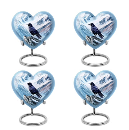 Dusty Blue Crow Cremation Urn angled view of lid and engraved motif - heart-shaped crow design symbolizing eternal love - 10 inch aluminum urn for cremated remains