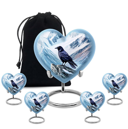 Powder Blue Crow Cremation Urn close-up of engraving and surface detail - loving heart memorial featuring crow pattern - memorial set with one large and four small urns