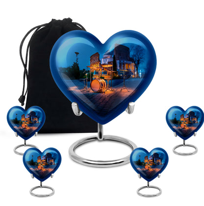 Navy Blue Drums Cremation Urn close-up of engraving and surface detail - heart-shaped drums design symbolizing eternal love - memorial set with one large and four small urns