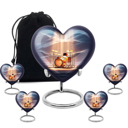 Twilight Blue Drums Cremation Urn close-up of engraving and surface detail - romantic heart urn with drums motif on aluminum - memorial set with one large and four small urns