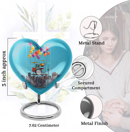 Cornflower Blue Drums Cremation Urn front view showing detailed design - compassionate heart-drums combination with gentle curves - mini keepsake memorial for portion of cremation ashes