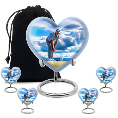 Dusty Blue Golf Cremation Urn close-up of engraving and surface detail - heart-shaped golf design symbolizing eternal love - memorial set with one large and four small urns