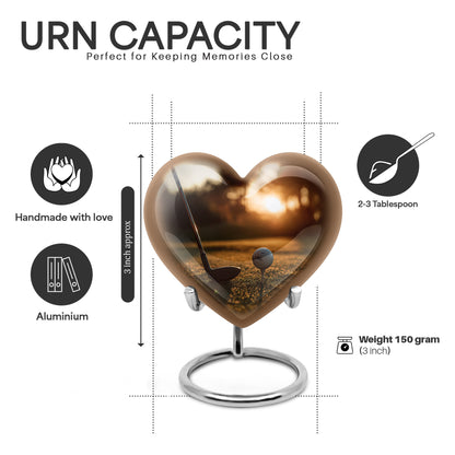 Harvest Gold Golf Cremation Urn front view showing detailed design - romantic heart urn with golf motif on aluminum - mini keepsake memorial for portion of cremation ashes