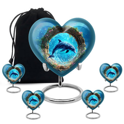 Azure Dolphin Cremation Urn close-up of engraving and surface detail - heart-shaped dolphin design symbolizing eternal love - memorial set with one large and four small urns