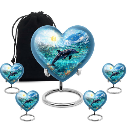 Navy Blue Dolphin Cremation Urn close-up of engraving and surface detail - loving heart memorial featuring dolphin pattern - memorial set with one large and four small urns