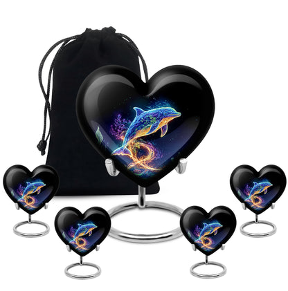 Glossy Black Dolphin Cremation Urn close-up of engraving and surface detail - heart-shaped dolphin design symbolizing eternal love - memorial set with one large and four small urns