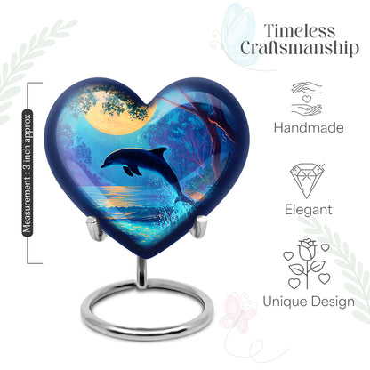 Soft Teal Dolphin Cremation Urn front view showing detailed design - heart-shaped dolphin design symbolizing eternal love - mini keepsake memorial for portion of cremation ashes