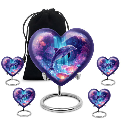 Icy Blue Dolphin Cremation Urn close-up of engraving and surface detail - heart-shaped dolphin design symbolizing eternal love - memorial set with one large and four small urns