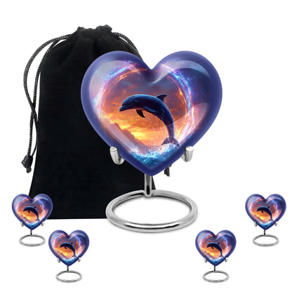 Icy Blue Dolphin Cremation Urn close-up of engraving and surface detail - heart-shaped dolphin design symbolizing eternal love - memorial set with one large and four small urns