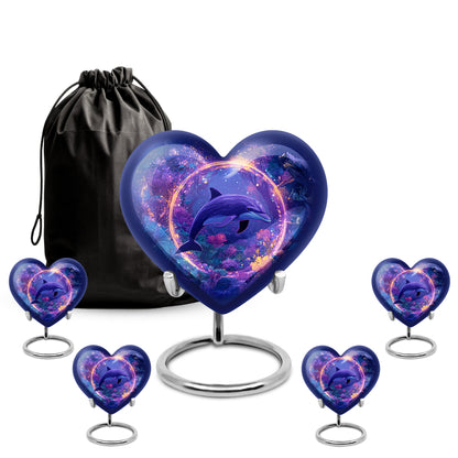 Pastel Blue Dolphin Cremation Urn close-up of engraving and surface detail - heart-shaped dolphin design symbolizing eternal love - memorial set with one large and four small urns