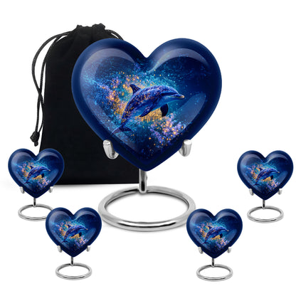 Icy Blue Dolphin Cremation Urn close-up of engraving and surface detail - heart-shaped dolphin design symbolizing eternal love - memorial set with one large and four small urns