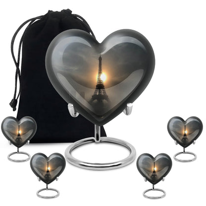 Ebony Eiffel Tower Cremation Urn close-up of engraving and surface detail - loving heart memorial featuring eiffel tower pattern - memorial set with one large and four small urns