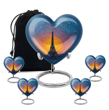 Bright Blue Eiffel Tower Cremation Urn close-up of engraving and surface detail - romantic heart urn with eiffel tower motif on aluminum - memorial set with one large and four small urns