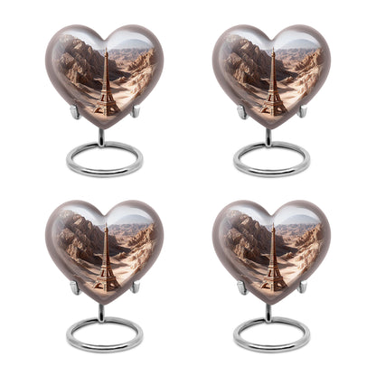 Chrome Silver Eiffel Tower Cremation Urn angled view of lid and engraved motif - compassionate heart-eiffel tower combination with gentle curves - 10 inch aluminum urn for cremated remains