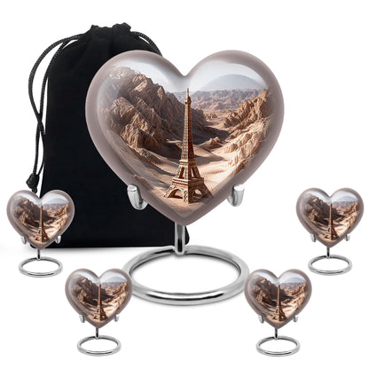 Chrome Silver Eiffel Tower Cremation Urn close-up of engraving and surface detail - compassionate heart-eiffel tower combination with gentle curves - memorial set with one large and four small urns