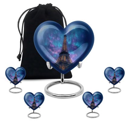 Powder Blue Eiffel Tower Cremation Urn close-up of engraving and surface detail - heart-shaped eiffel tower design symbolizing eternal love - memorial set with one large and four small urns