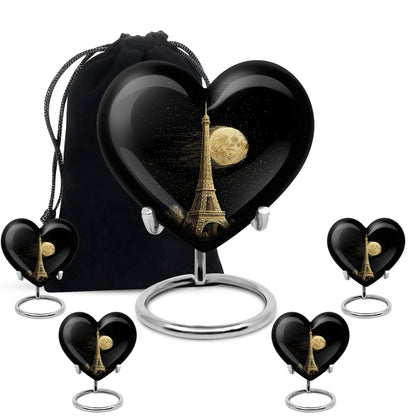 Glossy Black Eiffel Tower Cremation Urn close-up of engraving and surface detail - heart-shaped eiffel tower design symbolizing eternal love - memorial set with one large and four small urns