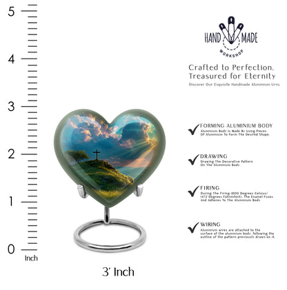Deep Teal Cross Cremation Urn front view showing detailed design - romantic heart urn with cross motif on aluminum - mini keepsake memorial for portion of cremation ashes