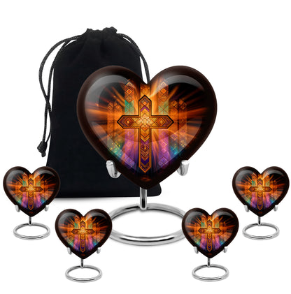 Ebony Cross Cremation Urn close-up of engraving and surface detail - heart-shaped cross design symbolizing eternal love - memorial set with one large and four small urns