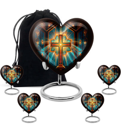 Deep Red Cross Cremation Urn close-up of engraving and surface detail - heart-shaped cross design symbolizing eternal love - memorial set with one large and four small urns