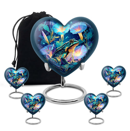 Icy Blue Frog Cremation Urn close-up of engraving and surface detail - heart-shaped frog design symbolizing eternal love - memorial set with one large and four small urns