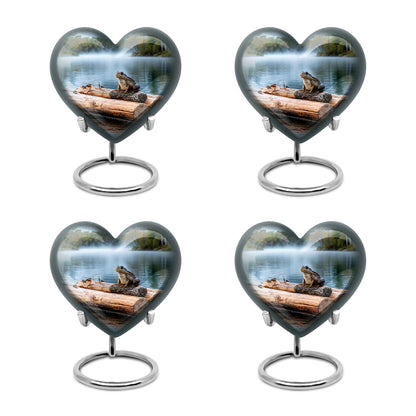 Sterling Silver Frog Cremation Urn angled view of lid and engraved motif - loving heart memorial featuring frog pattern - 10 inch aluminum urn for cremated remains