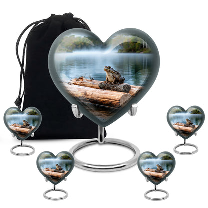 Gleaming Silver Frog Cremation Urn close-up of engraving and surface detail - heart-shaped frog design symbolizing eternal love - memorial set with one large and four small urns