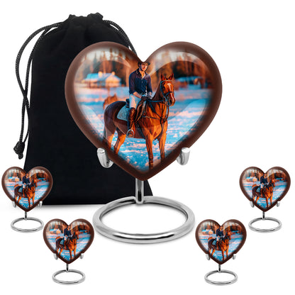 Gleaming Silver Horse Polo Cremation Urn close-up of engraving and surface detail - heart-shaped horse polo design symbolizing eternal love - memorial set with one large and four small urns