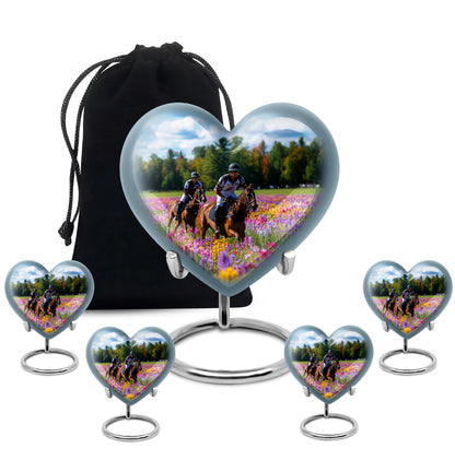 Icy Blue Horse Polo Cremation Urn close-up of engraving and surface detail - heart-shaped horse polo design symbolizing eternal love - memorial set with one large and four small urns