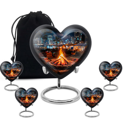 Dark Black Campfire Cremation Urn close-up of engraving and surface detail - romantic heart urn with campfire motif on aluminum - memorial set with one large and four small urns