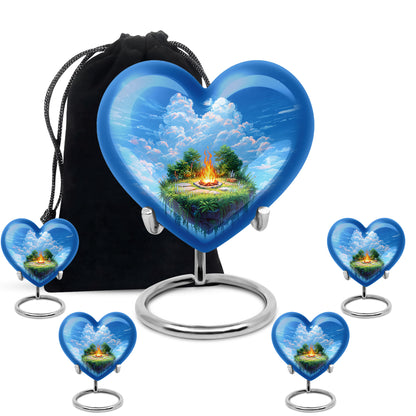 Indigo Campfire Cremation Urn close-up of engraving and surface detail - heart-shaped campfire design symbolizing eternal love - memorial set with one large and four small urns