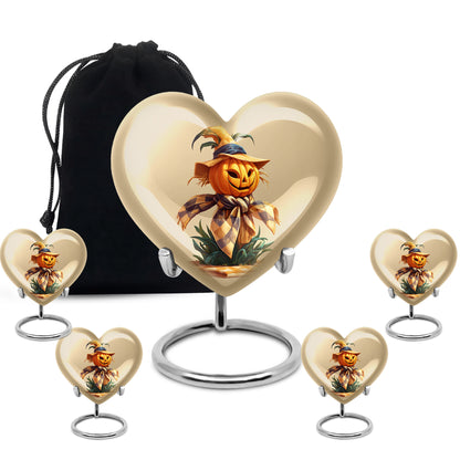 Royal Gold Halloween Cremation Urn close-up of engraving and surface detail - romantic heart urn with halloween motif on aluminum - memorial set with one large and four small urns