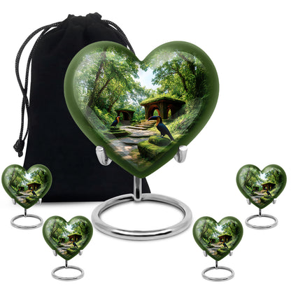 Moss Green Hornbill Cremation Urn close-up of engraving and surface detail - heart-shaped hornbill design symbolizing eternal love - memorial set with one large and four small urns