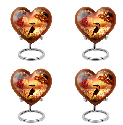 Ruby Red Hornbill Cremation Urn angled view of lid and engraved motif - romantic heart urn with hornbill motif on aluminum - 10 inch aluminum urn for cremated remains