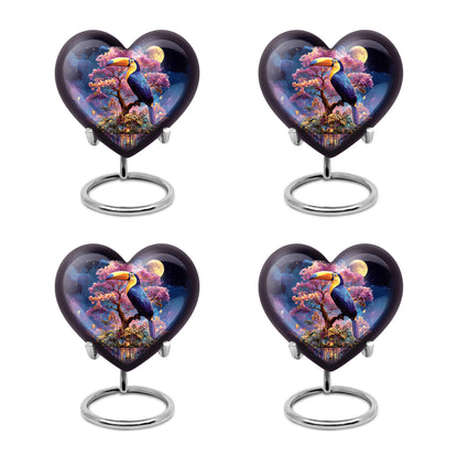 Pastel Blue Hornbill Cremation Urn angled view of lid and engraved motif - heart-shaped hornbill design symbolizing eternal love - 10 inch aluminum urn for cremated remains