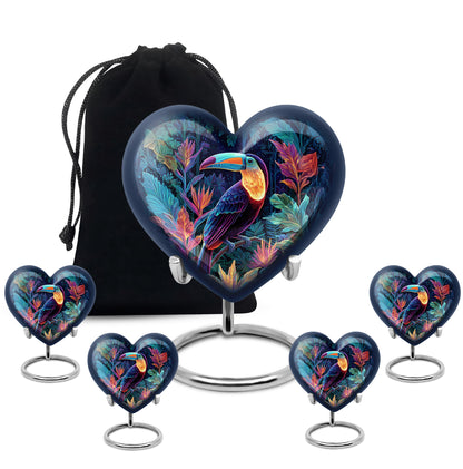 Pastel Blue Hornbill Cremation Urn close-up of engraving and surface detail - heart-shaped hornbill design symbolizing eternal love - memorial set with one large and four small urns