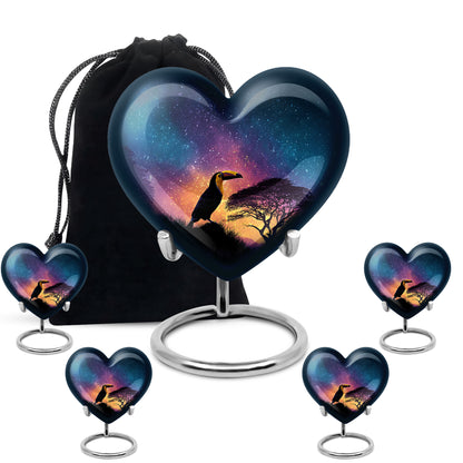 Sapphire Blue Hornbill Cremation Urn close-up of engraving and surface detail - romantic heart urn with hornbill motif on aluminum - memorial set with one large and four small urns