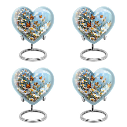 Soft Blue Daisy Cremation Urn angled view of lid and engraved motif - compassionate heart-daisy combination with gentle curves - 10 inch aluminum urn for cremated remains