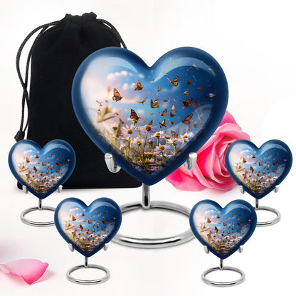 Twilight Blue Daisy Cremation Urn close-up of engraving and surface detail - romantic heart urn with daisy motif on aluminum - memorial set with one large and four small urns