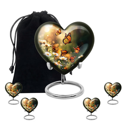Burnished Gold Daisy Cremation Urn close-up of engraving and surface detail - compassionate heart-daisy combination with gentle curves - memorial set with one large and four small urns