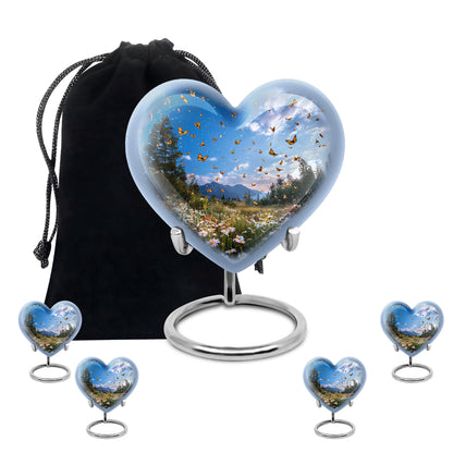 Dusty Blue Daisy Cremation Urn close-up of engraving and surface detail - heart-shaped daisy design symbolizing eternal love - memorial set with one large and four small urns