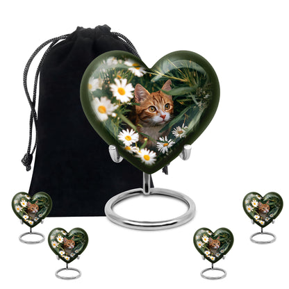 Emerald Green Daisy Cremation Urn close-up of engraving and surface detail - heart-shaped daisy design symbolizing eternal love - memorial set with one large and four small urns