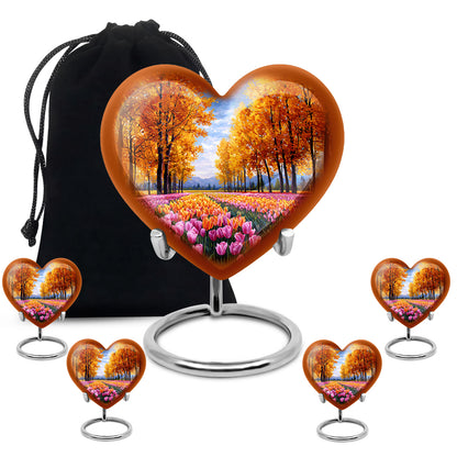 Sunrise Gold Garden Tulip Cremation Urn close-up of engraving and surface detail - heart-shaped garden tulip design symbolizing eternal love - memorial set with one large and four small urns