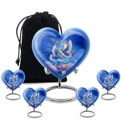 Dusty Blue Dove Cremation Urn close-up of engraving and surface detail - heart-shaped dove design symbolizing eternal love - memorial set with one large and four small urns